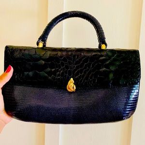 Deep purple leather bag with gold details